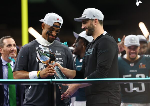 Feb 9, 2025; New Orleans, LA, USA; Philadelphia Eagles quarterback Jalen Hurts (1) and Philadelphia Eagles head coach Nick Sirianni celebrate with the Vince Lombardi Trophy after defeating the Kansas City Chiefs in Super Bowl LIX at Ceasars Superdome.