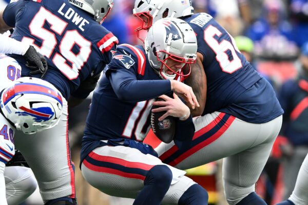 New England Patriots quarterback Drake Maye (10) is sacked during the first half of a game against the Buffalo Bills at Gillette Stadium.