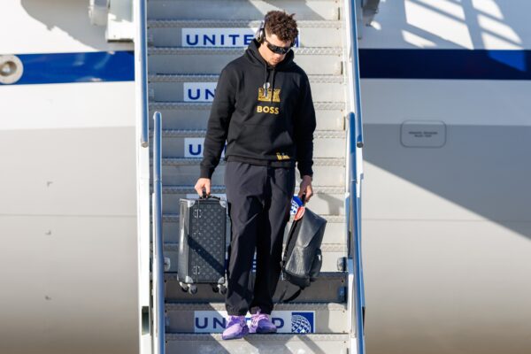 Feb 2, 2025; Kenner, LA, USA; Kansas City Chiefs quarterback Patrick Mahomes (15) exits the plane after arriving at Louis Armstrong New Orleans International Airport.