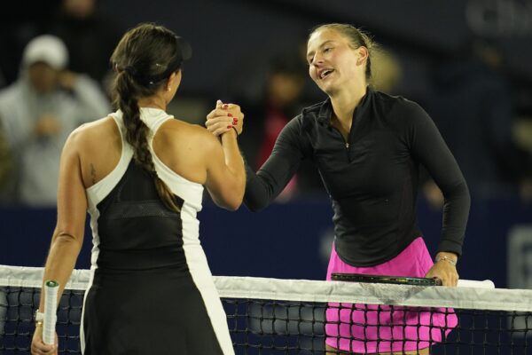 Mar 2, 2024; San Diego, CA, USA; Marta Kostyuk of Ukraine greets Jessica Pegula of the United States at the net after winning the semifinals of the San Diego Open at Barnes Tennis Center.