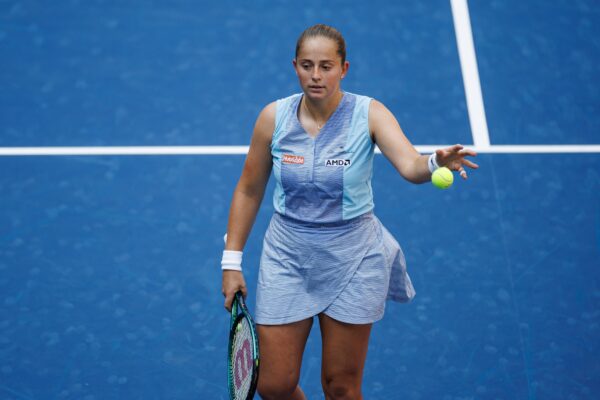 Aug 27, 2024; Flushing, NY, USA; Jelena Ostapenko of Latvia in action against Naomi Osaka of Japan in the first round of the women’s singles in the US Open at the USTA Billie Jean King Tennis Center.
