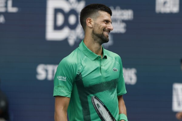 Mar 23, 2025; Miami, FL, USA; Novak Djokovic (SRB) smiles between points against Camilo Ugo Carabelli (ARG)(not pictured) on day six of the Miami Open at Hard Rock Stadium.