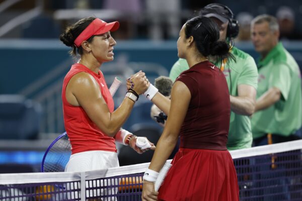 Mar 27, 2025; Miami, FL, USA; Jessica Pegula (USA)(L) shakes hands with Alexandra Eala (PHL)(R) at the net after their women's singles semifinal on day ten of the Miami Open at Hard Rock Stadium.
