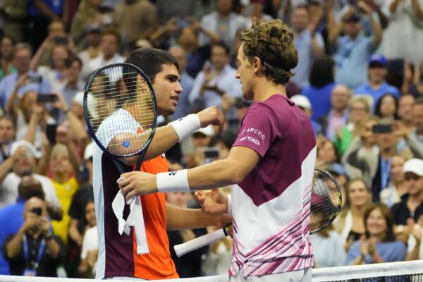 Sep 11, 2022; Flushing, NY, USA; Carlos Alcaraz (ESP) (L) hugs Casper Ruud (NOR) (R) after their match in the men's singles final on day fourteen of the 2022 U.S. Open tennis tournament at USTA Billie Jean King Tennis Center.