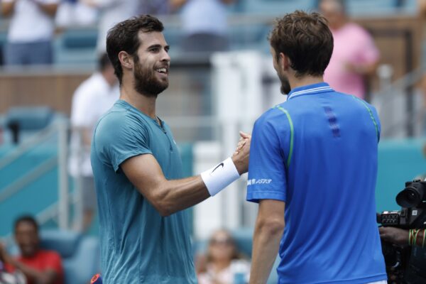 Mar 31, 2023; Miami, Florida, US; Daniil Medvedev (R) shakes hands with Karen Khachanov (L) after their men's singles semifinal on day twelve on the Miami Open at Hard Rock Stadium.