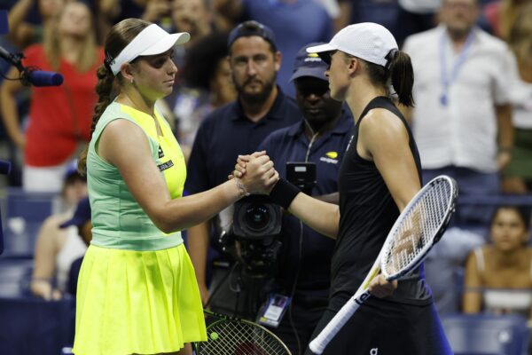 Sep 3, 2023; Flushing, NY, USA; Jelena Ostapenko of Latvia (L) shakes hands with Iga Swiatek of Poland (R) after their match on day seven of the 2023 U.S. Open tennis tournament at USTA Billie Jean King National Tennis Center.