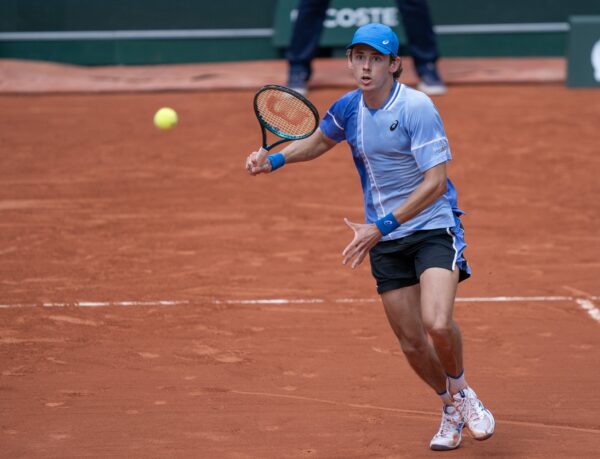 Jun 3, 2024; Paris, France; Alex De Minaur of Australia returns a shot during his match against Daniil Medvedev on day nine of Roland Garros at Stade Roland Garros.