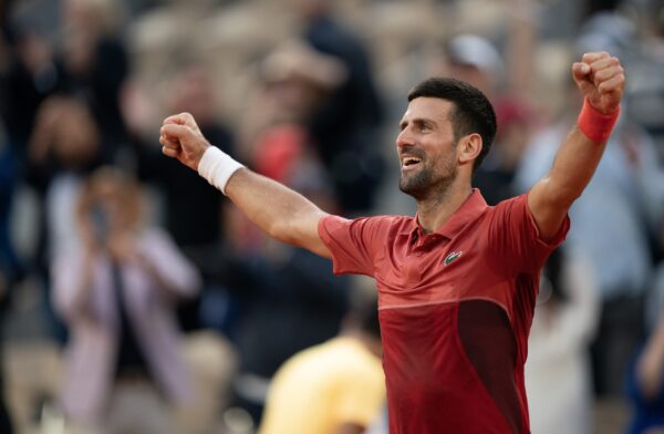 Jun 3, 2024; Paris, France; Novak Djokovic of Serbia celebrates winning his match against Francisco Cerundolo of Argentina on day nine of Roland Garros at Stade Roland Garros.