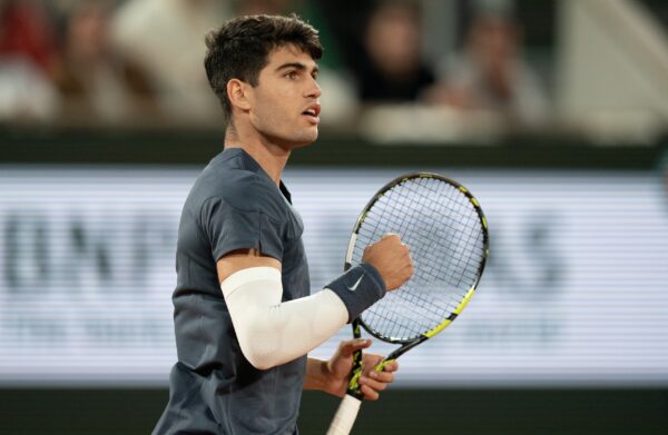 Jun 4, 2024; Paris, France; Carlos Alcaraz of Spain reacts to a point during his match against Stefanos Tsitsipas of Greece on day 10 of Roland Garros at Stade Roland Garros.