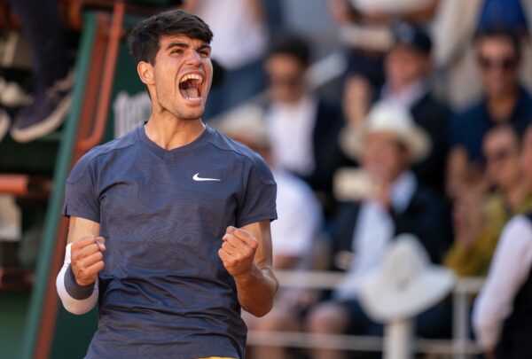Jun 7, 2024; Paris, France; Carlos Alcaraz of Spain celebrates winning his match against Jannik Sinner of Italy on day 13 of Roland Garros at Stade Roland Garros.