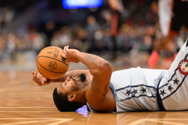 Mar 31, 2025; Washington, District of Columbia, USA; Washington Wizards guard Marcus Smart (36) reacts after being fouled during the second quarter against the Miami Heat at Capital One Arena.