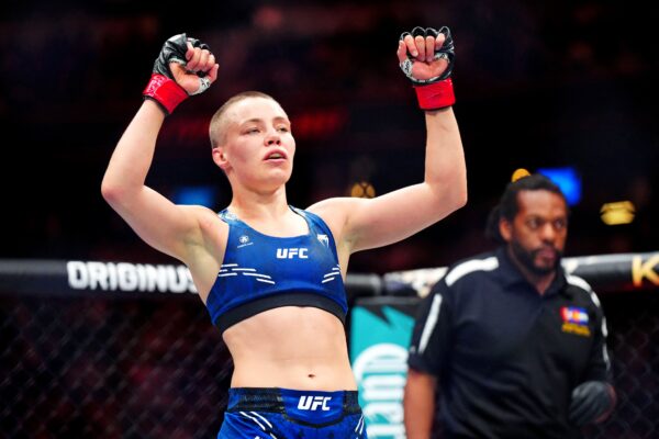 Jul 13, 2024; Denver, Colorado, USA; Rose Namajunas (red gloves) celebrates after defeating Tracy Cortez (blue gloves) during UFC Fight Night at Ball Arena.