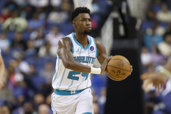 Charlotte Hornets forward Brandon Miller (24) passes the ball against the Memphis Grizzlies in the first half at First Horizon Coliseum.
