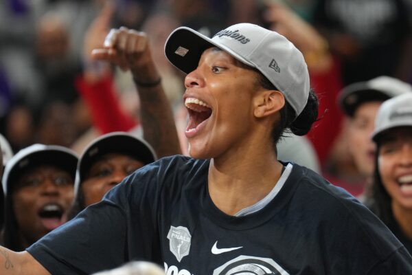 Las Vegas Aces center A'ja Wilson (22) celebrates with teammates after game four of the 2025 WNBA Finals at Mortgage Matchup Center.