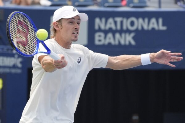 Aug 3, 2025; Toronto, ON, Canada; Alex De Minaur (AUS) hits a ball to Frances Tiafoe (not pictured) during round four at Sobeys Stadium.