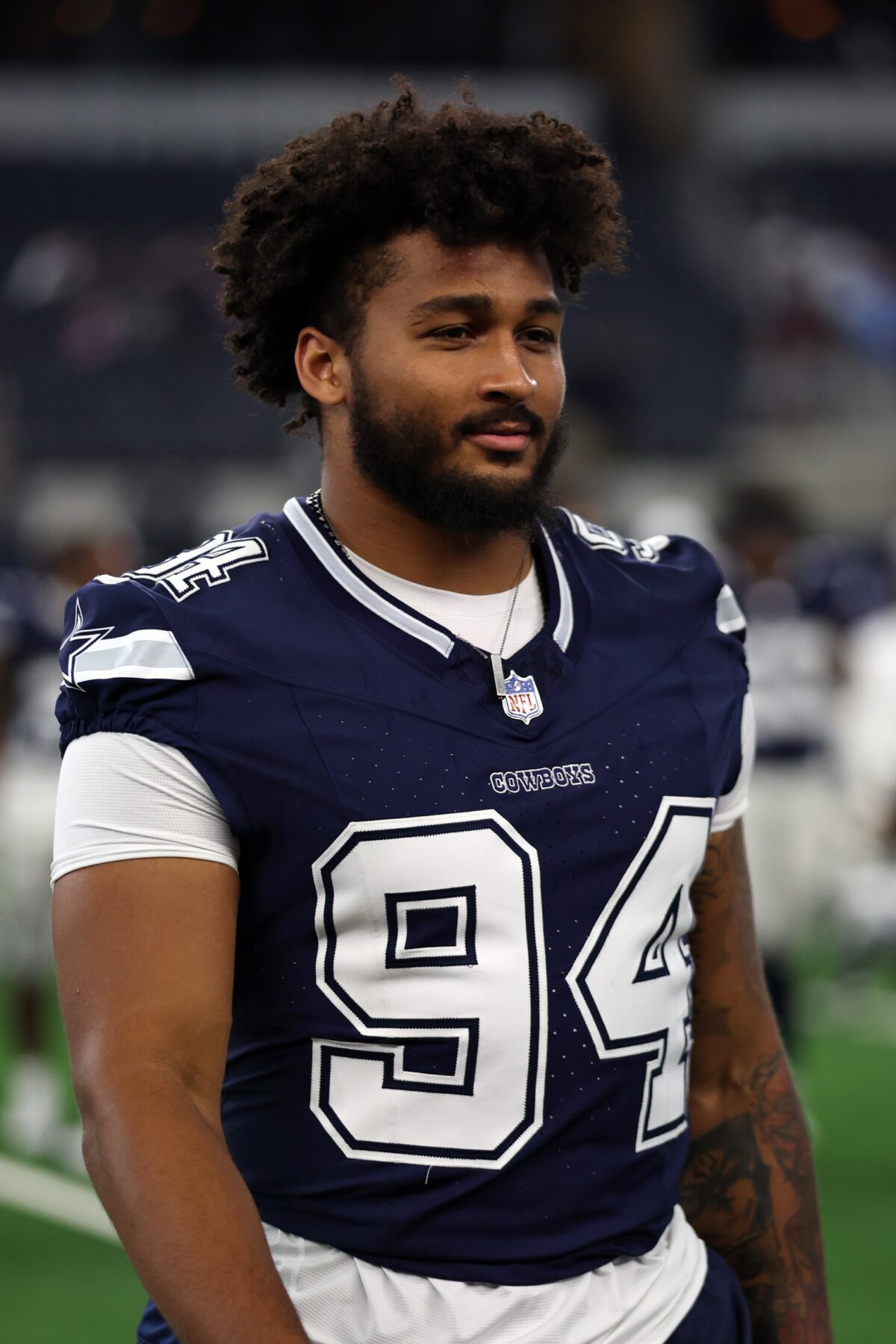 Dallas Cowboys defensive end Marshawn Kneeland (94) walks off the field after the game against the Los Angeles Chargers at AT&T Stadium.