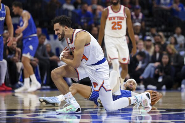 New York Knicks guard Landry Shamet (44) reacts after an injury against the Orlando Magic in the first quarter at Kia Center.