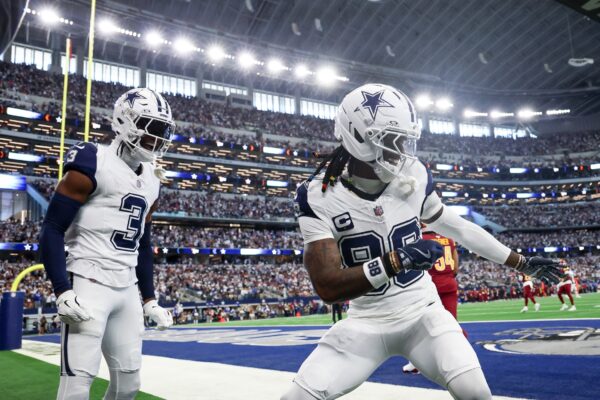 Dallas Cowboys wide receiver Ceedee Lamb (88) celebrates after scoring a touchdown against the Washington Commanders during the first quarter of the game at AT&T Stadium.
