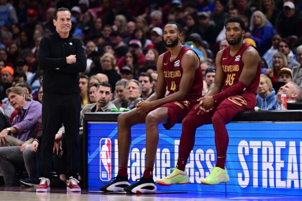 Cleveland Cavaliers forward Evan Mobley (4) and guard Donovan Mitchell (45) wait along side head coach Kenny Atkinson to enter the game during the first half against the New York Knicks at Rocket Arena.