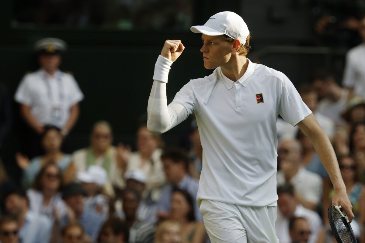 Jul 13, 2025; Wimbledon, United Kingdom; Jannik Sinner (ITA) reacts after winning the third set against Carlos Alcaraz (ESP)(not pictured) in the gentlemen's' singles final of The Championships Wimbledon 2025 at All England Lawn Tennis and Croquet Club.