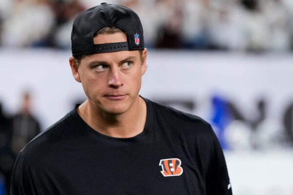 Injured Cincinnati Bengals quarterback Joe Burrow (9) walks the field shaking hands after the NFL Week 7 game between the Cincinnati Bengals and the Pittsburgh Steelers at Paycor Stadium.