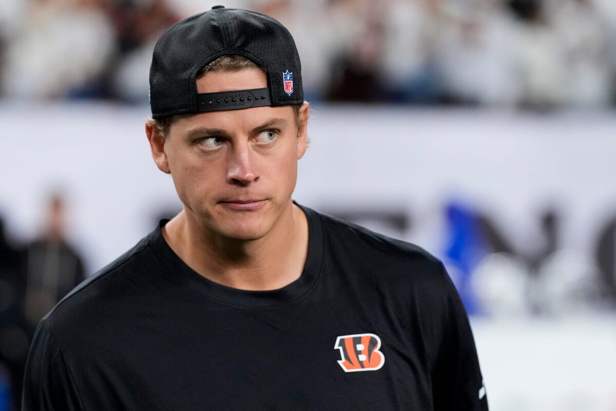 Injured Cincinnati Bengals quarterback Joe Burrow (9) walks the field shaking hands after the NFL Week 7 game between the Cincinnati Bengals and the Pittsburgh Steelers at Paycor Stadium.