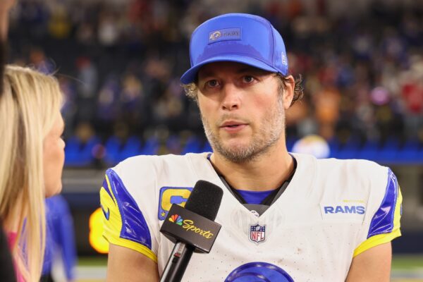 Los Angeles Rams quarterback Matthew Stafford (9) stands on the field for an interview after the game against the Tampa Bay Buccaneers at SoFi Stadium.