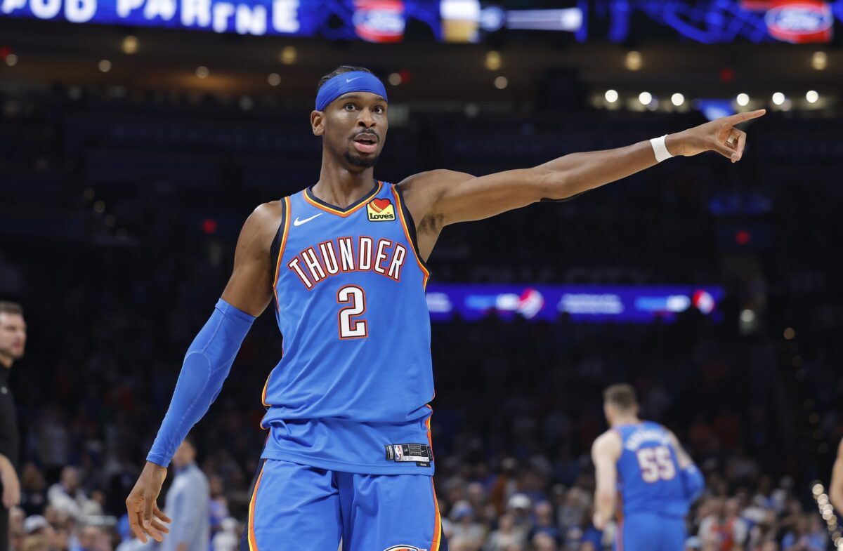 Oklahoma City Thunder guard Shai Gilgeous-Alexander (2) gestures to his team before a play against the Portland Trail Blazers during the second quarter at Paycom Center.