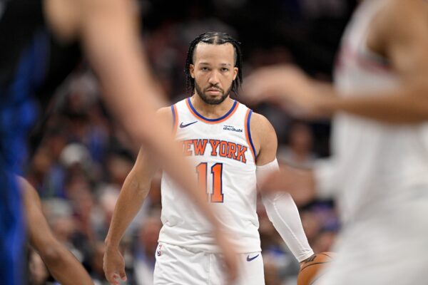 New York Knicks guard Jalen Brunson (11) looks to set the play against the Dallas Mavericks during the second half at the American Airlines Center.