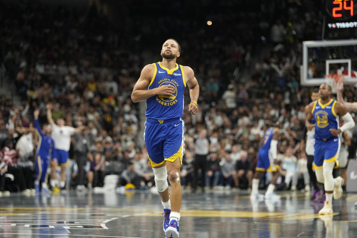 Golden State Warriors guard Stephen Curry (30) gets back on defense after scoring a three-point basket during the second half against the San Antonio Spurs at Frost Bank Center.