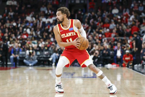Atlanta Hawks guard Trae Young (11) looks to pass the ball against the Chicago Bulls during the second half at United Center.