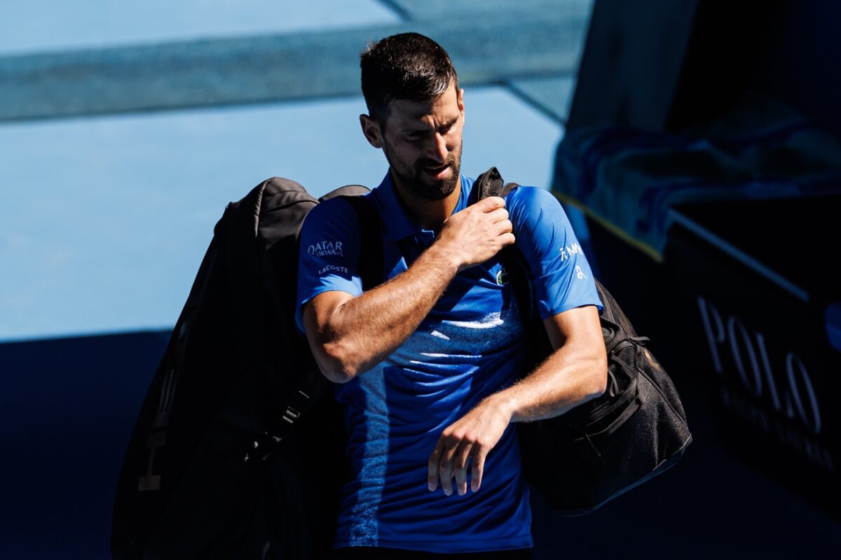 Jan 24, 2025; Melbourne, Victoria, Australia; Novak Djokovic of Serbia exits after his match against Alexander Zverev of Germany in the semifinals of the men's singles at the 2025 Australian Open at Melbourne Park.