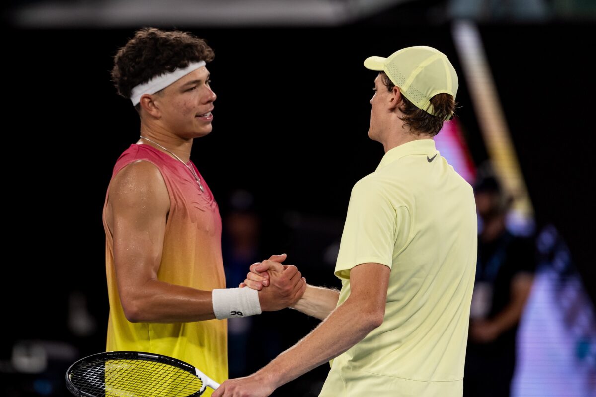 Jan 24, 2025; Melbourne, Victoria, Australia; Jannik Sinner of Italy and Ben Shelton of United States of America shake hands after their match in the semifinals of the men's singles at the 2025 Australian Open at Melbourne Park.