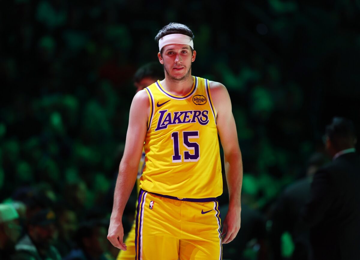 Los Angeles Lakers guard Austin Reaves (15) against the Phoenix Suns at Mortgage Matchup Center.