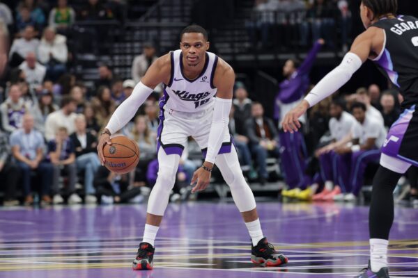 Sacramento Kings guard Dennis Schroder (17) controls the ball away from Utah Jazz guard Keyonte George (3) during the first quarter at Delta Center.