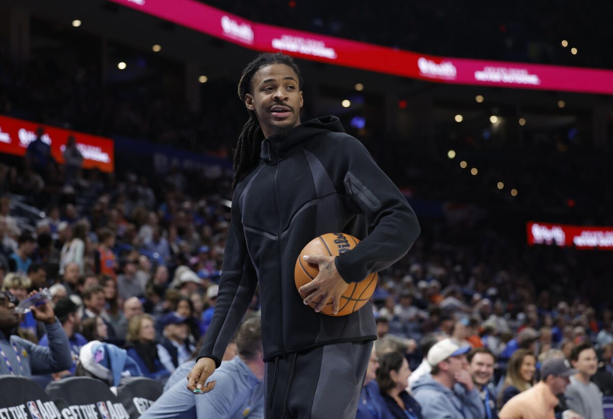 Memphis Grizzlies guard Ja Morant (12) walks off the court during a time out against the Oklahoma City Thunder during the second half at Paycom Center.