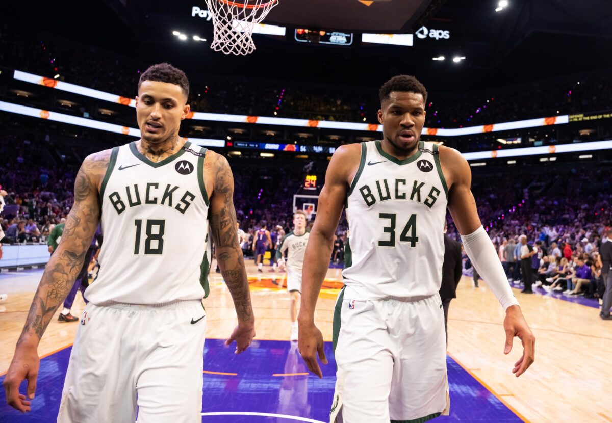 Milwaukee Bucks forward Kyle Kuzma (18) and forward Giannis Antetokounmpo (34) against the Phoenix Suns at Footprint Center.