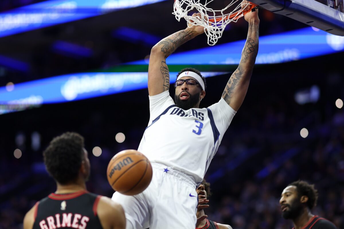 Dallas Mavericks forward Anthony Davis (3) dunks the ball in front of Philadelphia 76ers guard Quentin Grimes (5) during the first quarter at Xfinity Mobile Arena.