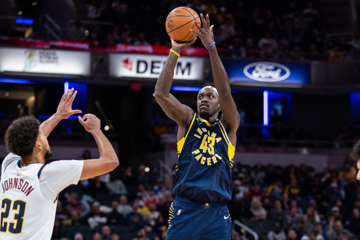 Indiana Pacers forward Pascal Siakam (43) shoots the ball while Denver Nuggets forward Cameron Johnson (23) defends in the second half at Gainbridge Fieldhouse.