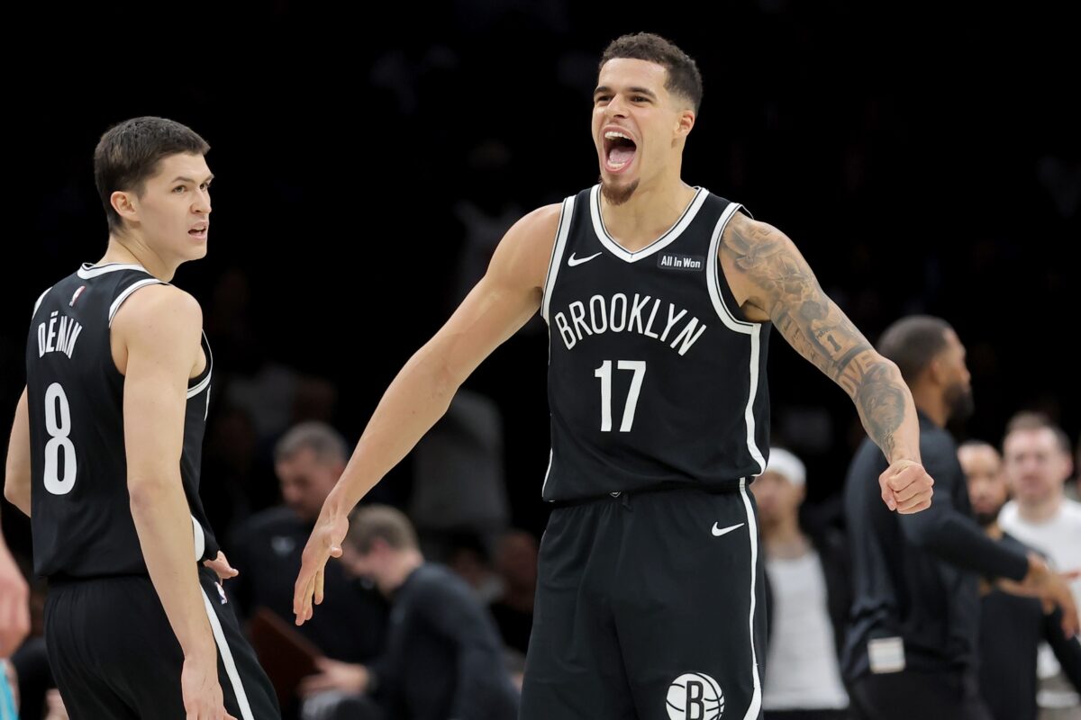 Brooklyn Nets forward Michael Porter Jr. (17) reacts with guard Egor Demin (8) during the fourth quarter against the Charlotte Hornets at Barclays Center.