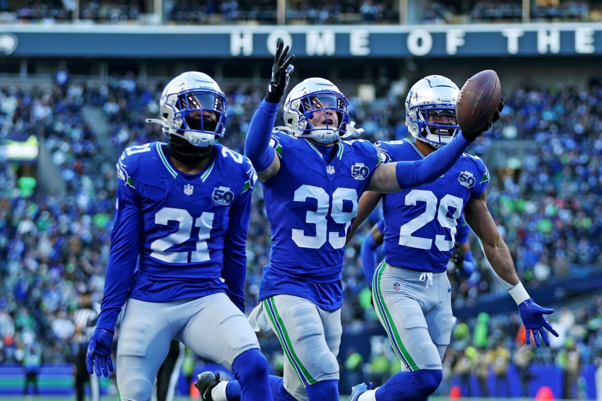 Seattle Seahawks safety Ty Okada (39) celebrates after retrieving a fumble during the second half against the Minnesota Vikings at Lumen Field.