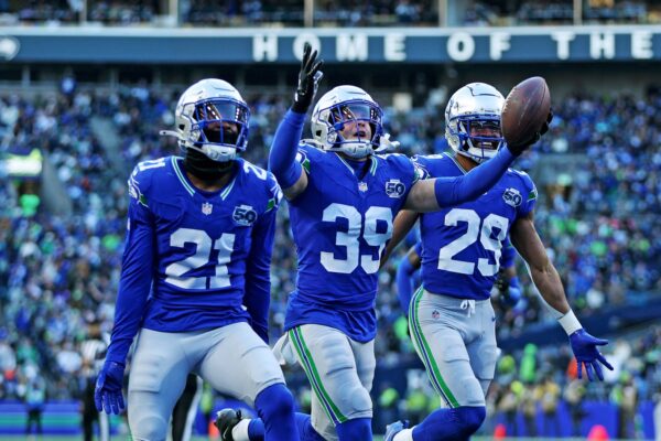 Seattle Seahawks safety Ty Okada (39) celebrates after retrieving a fumble during the second half against the Minnesota Vikings at Lumen Field.