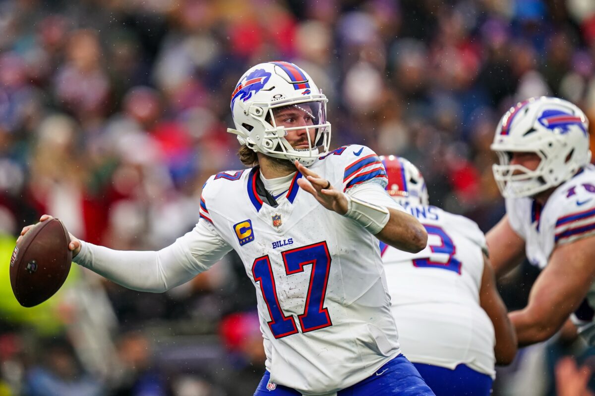 Buffalo Bills quarterback Josh Allen (17) passes the ball against the New England Patriots in the second half at Gillette Stadium.