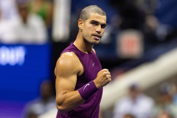 Aug 25, 2025; Flushing, NY, USA; Carlos Alcaraz of Spain in action against Reilly Opelka of the United States in the first round of the men&rsquo;s singles at the US Open at Arthur Ashe Stadium in Billie Jean King National Tennis Centre.