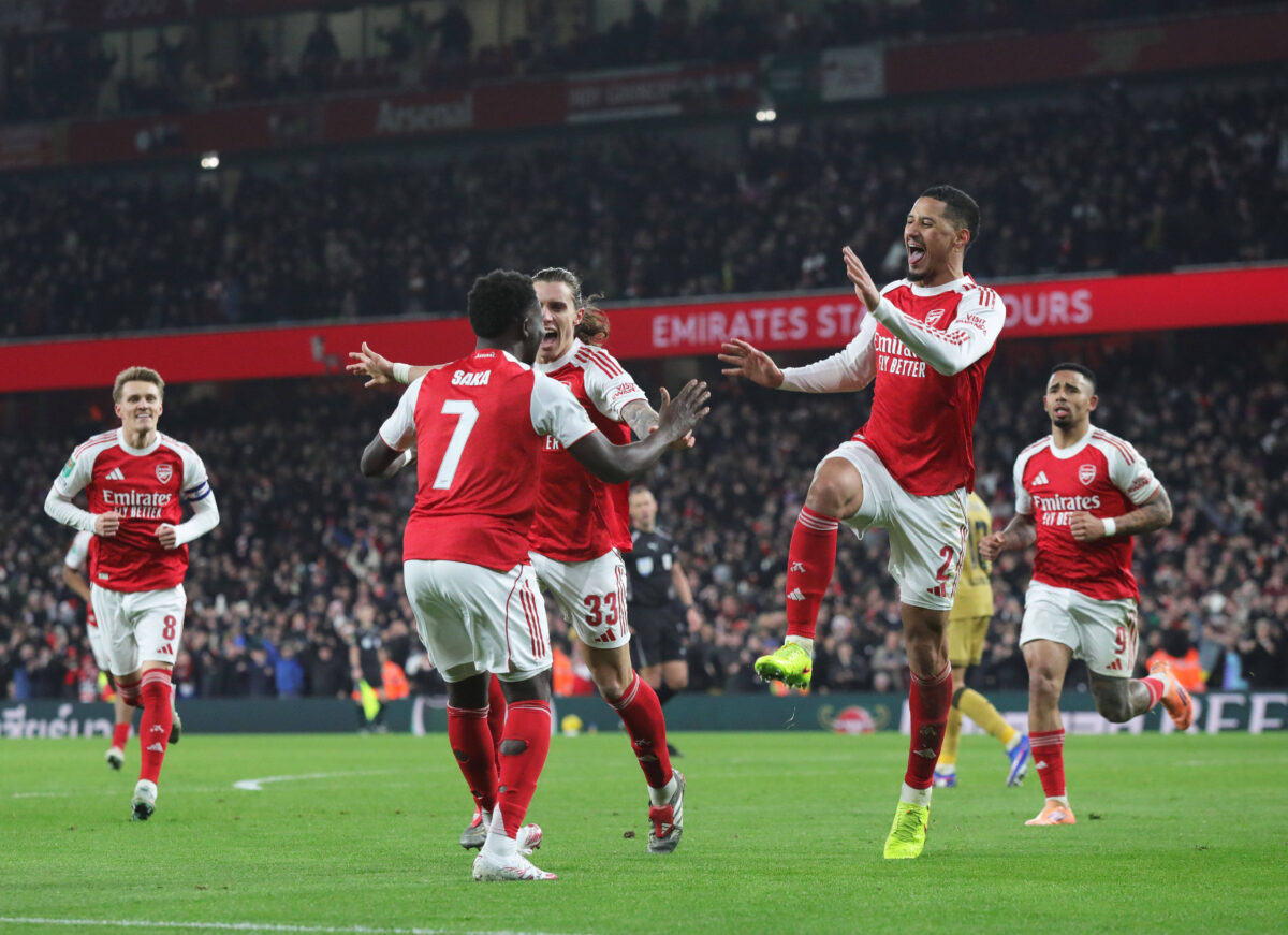 Goal celebrations for Arsenal as Riccardo Calafiori, William Saliba and Bukayo Saka of Arsenal celebrates the opening goal during the Carabao Cup Quarter-Final match between Arsenal and Crystal Palace on 23rd December 2025 at Emirates Stadium, London.