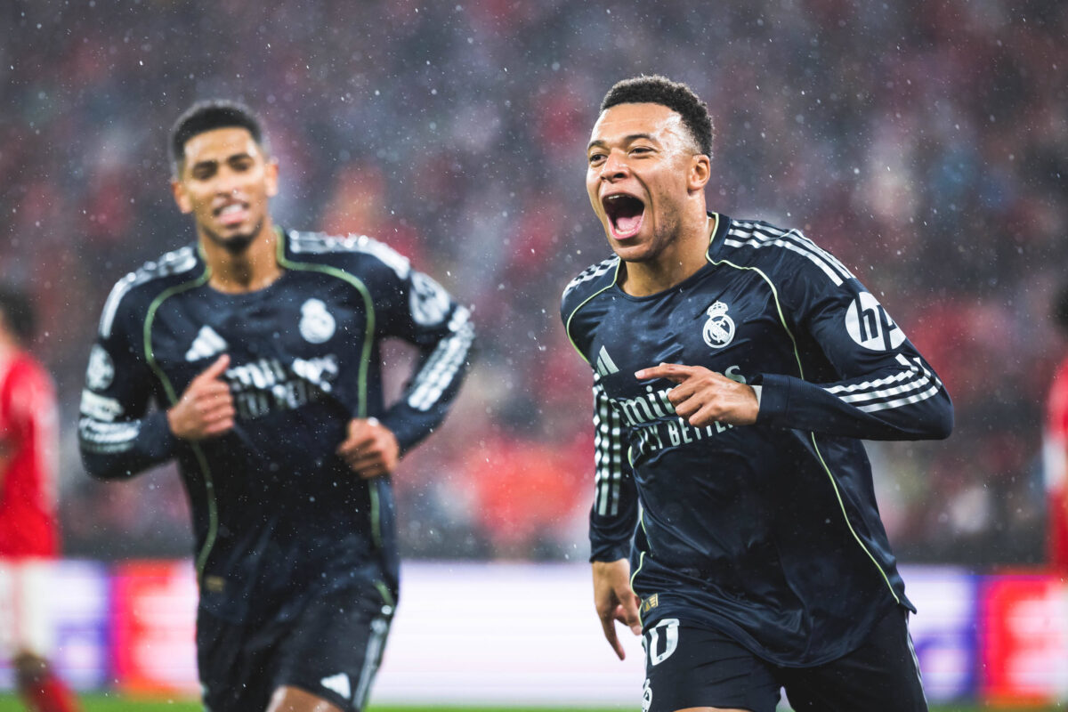Kylian Mbappe of Real Madrid CF (R) celebrates the goal with his teammate Jude Bellingham of Real Madrid CF (L) during the UEFA Champions League 2025 26 League Phase MD8 match between SL Benfica and Real Madrid CF at Estadio da Luz. Final score; SL Benfica 4 : 2 Real Madrid CF.