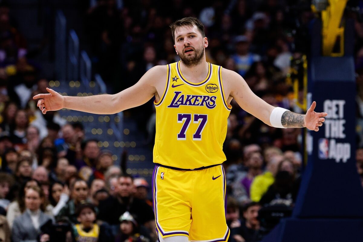 Los Angeles Lakers guard Luka Doncic (77) reacts after a play in the third quarter against the Denver Nuggets at Ball Arena.