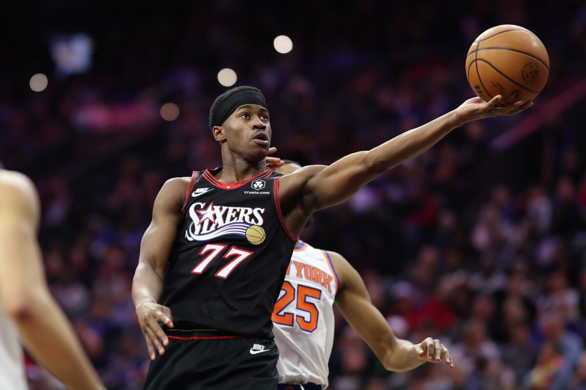 Philadelphia 76ers guard Vj Edgecombe (77) drives against the New York Knicks during the second half at Xfinity Mobile Arena.
