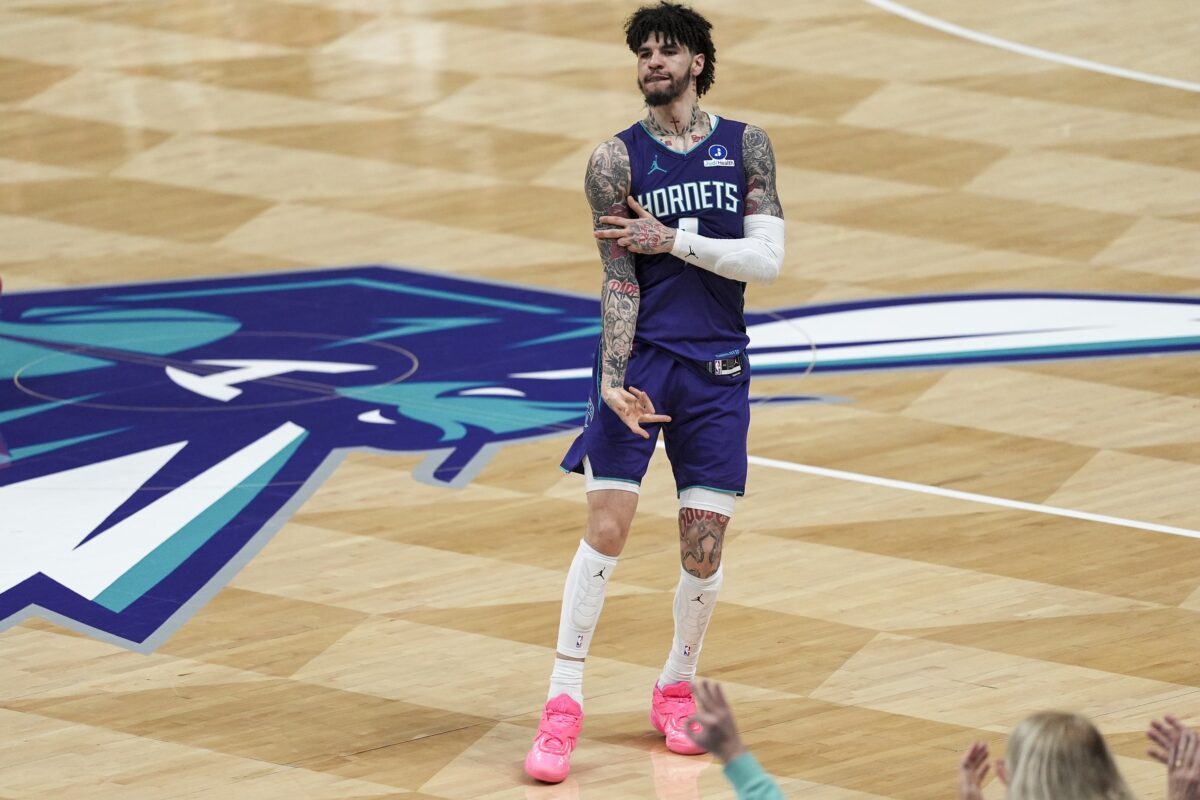 Charlotte Hornets guard LaMelo Ball (1) reacts to his three point basket during the second half against the Atlanta Hawks at Spectrum Center.