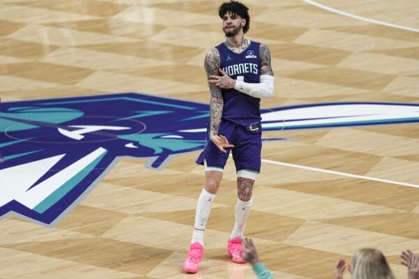 Charlotte Hornets guard LaMelo Ball (1) reacts to his three point basket during the second half against the Atlanta Hawks at Spectrum Center.